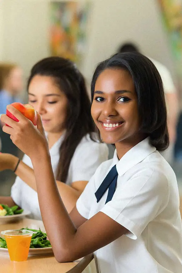 Students enjoying lunch in cafeteria